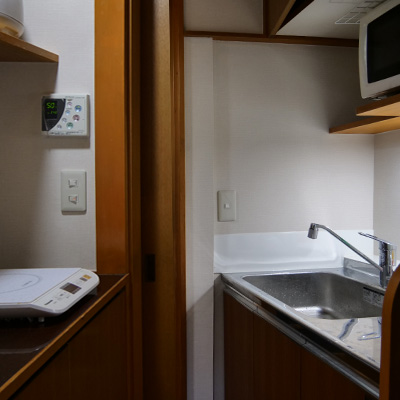 Kitchenette connected to the Living/dining room.